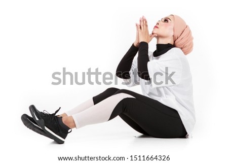Sporty asian woman doing yoga practice isolated on white background. Concept of healthy life and natural balance between body and mental development.