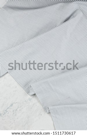 Pleated fabric on bright background