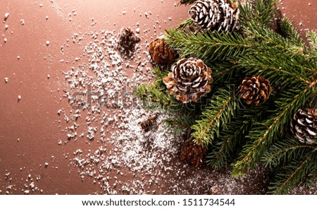 Christmas brown background, pine cone, candy and other decoration. 