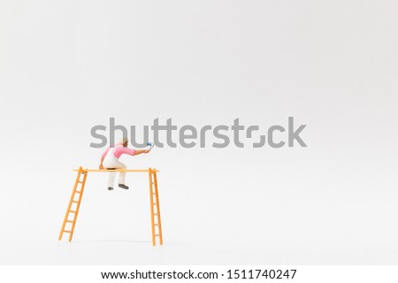 Miniature people : Painter holding a brush with  space for text