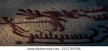 World heritage Ancient petroglyphs rock carvings of Vitlycke in Tanum, Sweden.