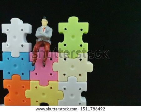model a man people on puzzle with black background