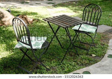 iron chair and table in the cafe garden