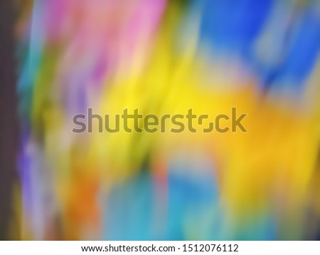 Defocused background blur bokeh in multi color pink blue green yellow and orange color
