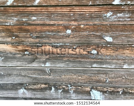 wall of wooden boards, textured background of bars made of natural forest material