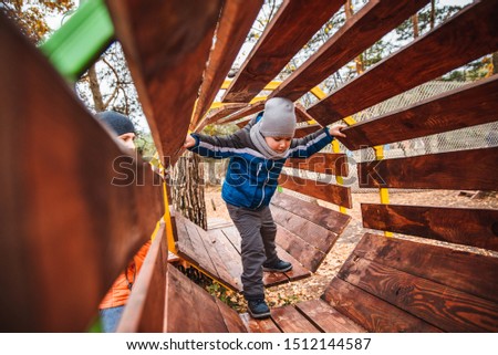 little toddler boy play at playground healthy active child autumn season
