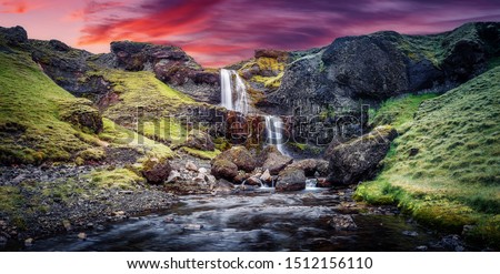 Scenic image of Iceland nature. Amazing Natural scenery. Colorful summer sunrise, Waterfall with dramatic picturesque sky.  Picture of wild area. Iceland  the most beautiful and best travel place