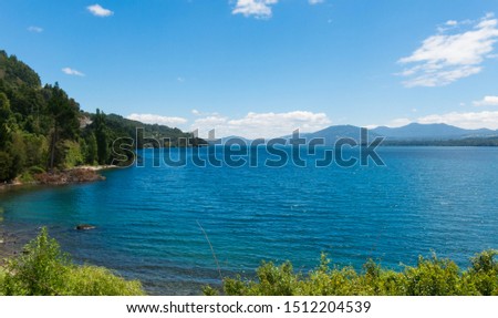 The Calafquen Lake, which straddles the border between the La Araucania Region and Los Rios Region. It is one of the Seven Lakes. Patagonia Chile Royalty-Free Stock Photo #1512204539