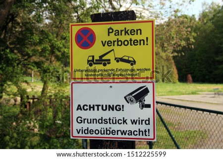 Traffic sign with the inscription. "No parking" and "Attention! Property is video-monitored"