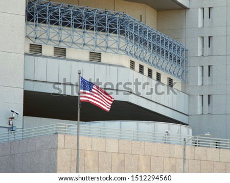 Prison Correctional Facility Close Up with American Flag Royalty-Free Stock Photo #1512294560