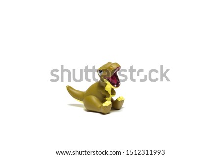 T-Rex toy dinosaur, baby toy, isolated on white background, design element