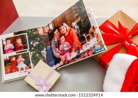 Christmas photo book, gifts on the table