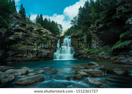 Waterfall landscape in northern Spain, long exposure, sightseeing Europe. Breathtaking picture of the popular tourist attraction.