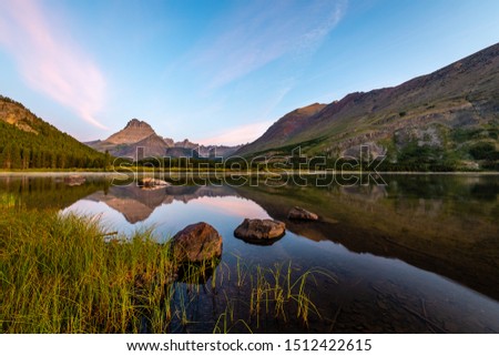 Sunrise Reflections of Swiftcurrent Lake from Many Glacier