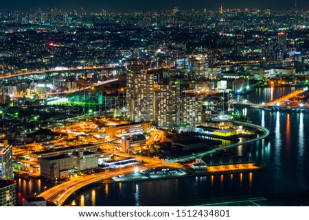 Asia business concept for real estate and corporate construction - panoramic modern city skyline aerial view under blue night sky in Yokohama, Japan