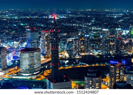Asia business concept for real estate and corporate construction - panoramic modern city skyline aerial view under blue night sky in Yokohama, Japan