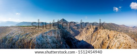 Scenic view of mountain against cloudy sky, Crete, Greece
