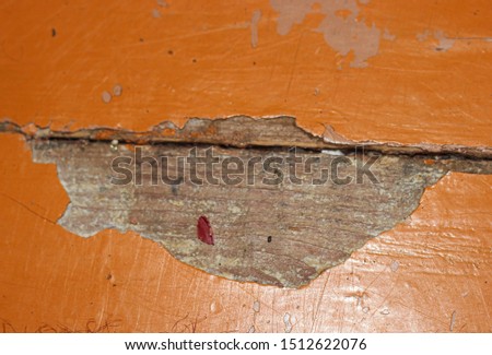 Old wooden floor with peeling old paint