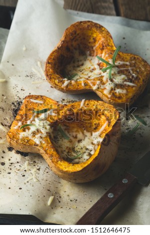 Baked pumpkin with spices and grated cheese
