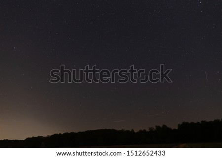 Milky way in the evening sky in the warm august