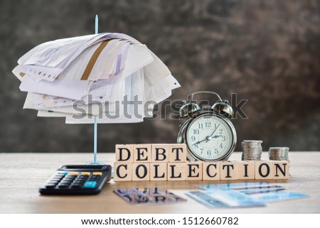 debt collection concept with unpaid bills,calculator,coin on desk  Royalty-Free Stock Photo #1512660782