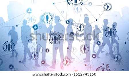 Silhouettes of diverse business people working in modern city with double exposure of HUD social network interface. Concept of HR and international company. Toned image