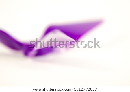 Closeup of quadcopter or drone proppeler for freestyle or racing drone. 5051 3 blade propellers in purple taken in high key