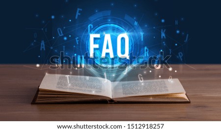 FAQ inscription coming out from an open book, digital technology concept