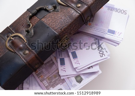 vintage open chest with lots of money euro banknotes. Concept of wealth and abundance.