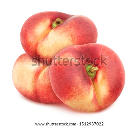 Composition with juicy flat nectarines isolated on white background.