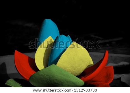 Colourful artificial flowers around a place unique photo