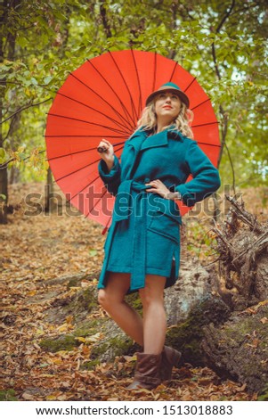 Lady walk in autumn park, fashionable woman in casual style outdoors portrait