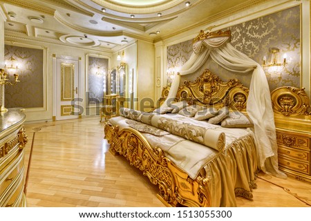 luxurious  interior. Designer modern renovation in a luxury house. Stylish bedroom interior with double bed