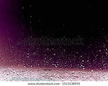 scenic drop of water on clear glass surface in minimal and close up style so beautiful pattern for awesome texture background 