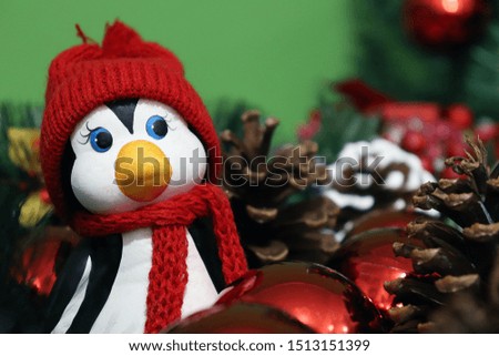 Picture of a beautiful penguin in a Christmas setting !!