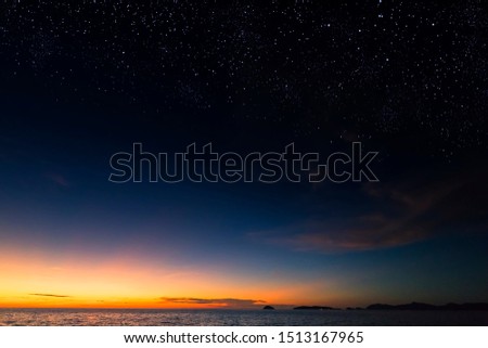 Starry dusky sky scenery over the sea. Royalty-Free Stock Photo #1513167965