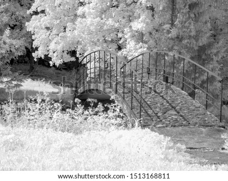 infrared photography with river view and beautiful bridge, picture taken with specially adapted infrared camera, Latvia