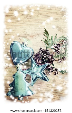 vintage christmas decorations with christmas tree and wooden background