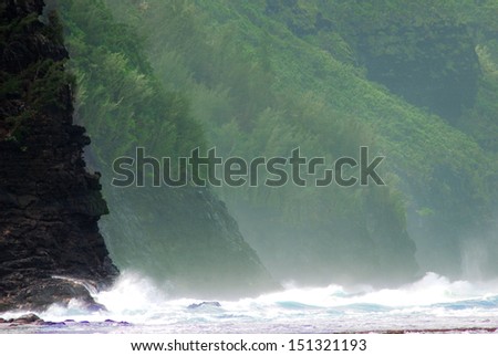 Kauai Hawaii mountainous shoreline crashing waves