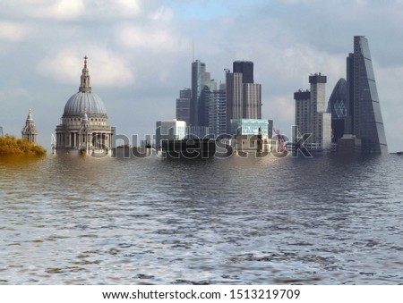 manipulated conceptual image of the city of london with historic buildings flooded due to global warming and rising sea levels