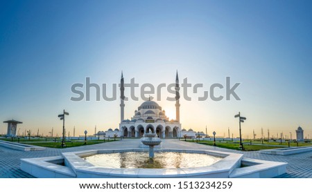 Sharjah New Mosque Tourist Destination in Dubai Arabic Letter means: Indeed, prayer has been decreed upon the believers a decree of specified times, 2020 ramadan and eid islamic  image Royalty-Free Stock Photo #1513234259