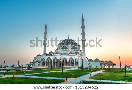 Colorful Sharjah Mosque New Attraction In Dubai beautiful traditional Islamic architecture, Arabic Letter means: Indeed, prayer has been decreed upon the believers a decree of specified times Royalty-Free Stock Photo #1513234622
