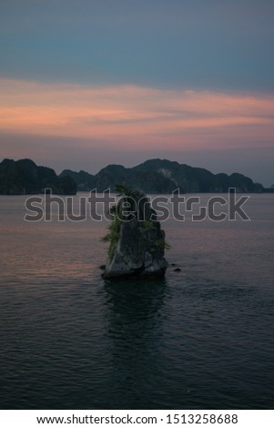 A picture of a wonderful sunset in a cruise in Halong Bay in Vietnam