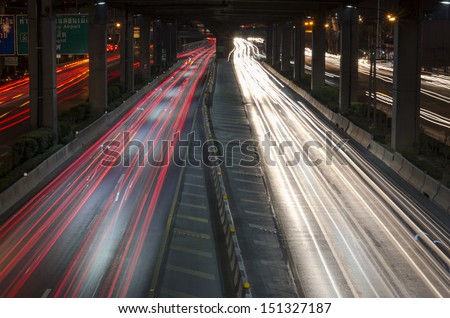 car lights at night in the city