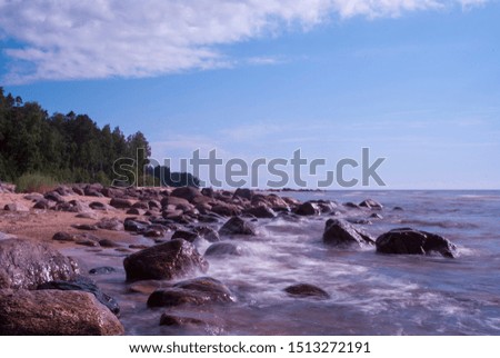 Aerial view to the Shoreline of Baltic sea beach with rocks