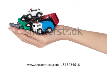 hand holding car toy kids isolated on a white background.
