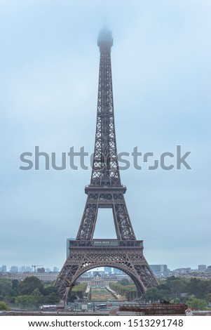 Eiffel Tower in the fog, vertical picture