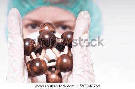Woman face and hands holding molecule, isolated on white.