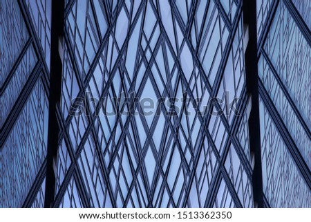 Collage photo of glass wall or ceiling with metal framework. Transparent modern architecture fragment with sky reflection. Abstract background on the subject of construction industry or technology.