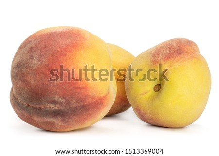 Group of three whole bright fresh fuzzy peach isolated on white background